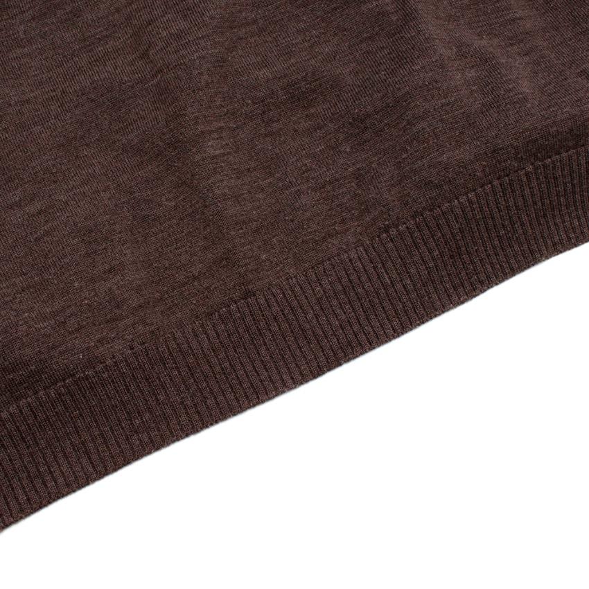 The Row Brown Wool & Cashmere blend Oversized Knit Cardigan

-Luxurious soft wool texture 
-Lightweight yet warm knit 
-Chevron texture panels to the sleeves 
-Ribbed hem and cuffs 
-Button fastening to the front 
-Classic and neutral style