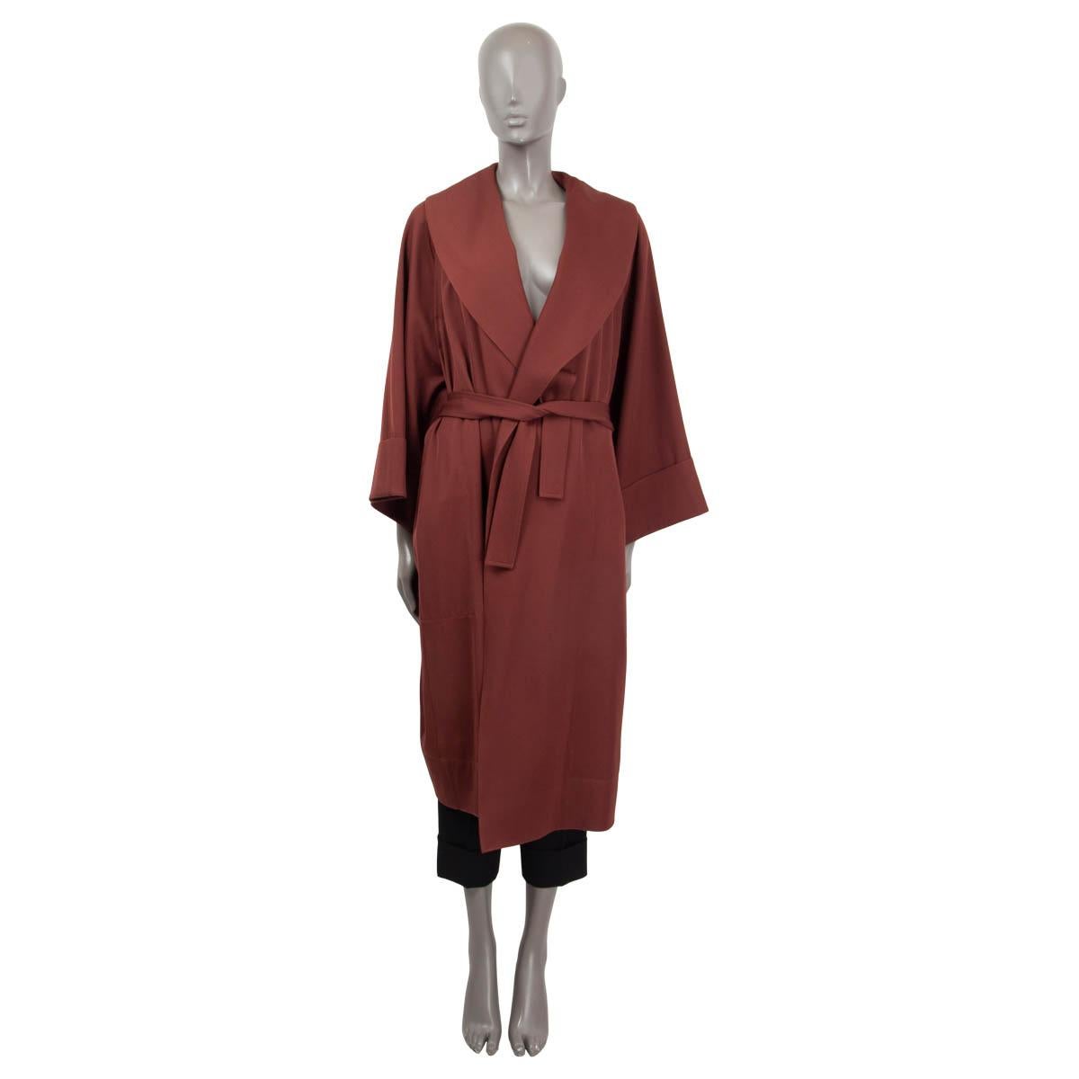 100% authentic The Row oversized belted wrap coat in burgundy wool (assumed cause tag is missing). Features 7/8 sleeves and two side slit pockets. Unlined. Shows a barely visible scratch on the back, otherwise in excellent