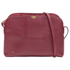 THE ROW burgundy red vintage inspired gold mirror trio zip pocket shoulder bag