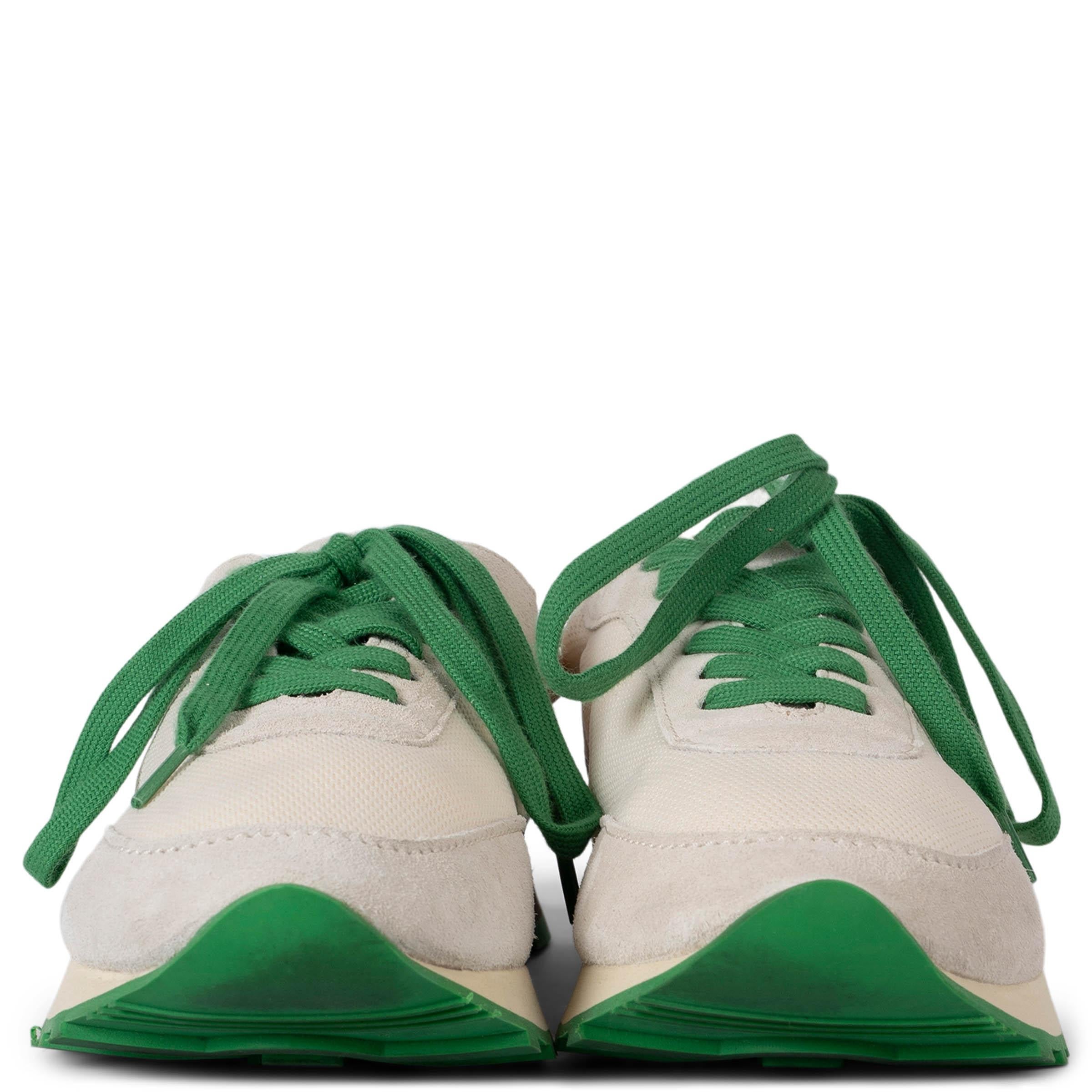 These 100% authentic The Row Owen vintage-style sneakers are crafted from technical mesh and beige suede, combining retro-inspired design with modern functionality. They feature green laces for a distinctive touch and treaded rubber soles for