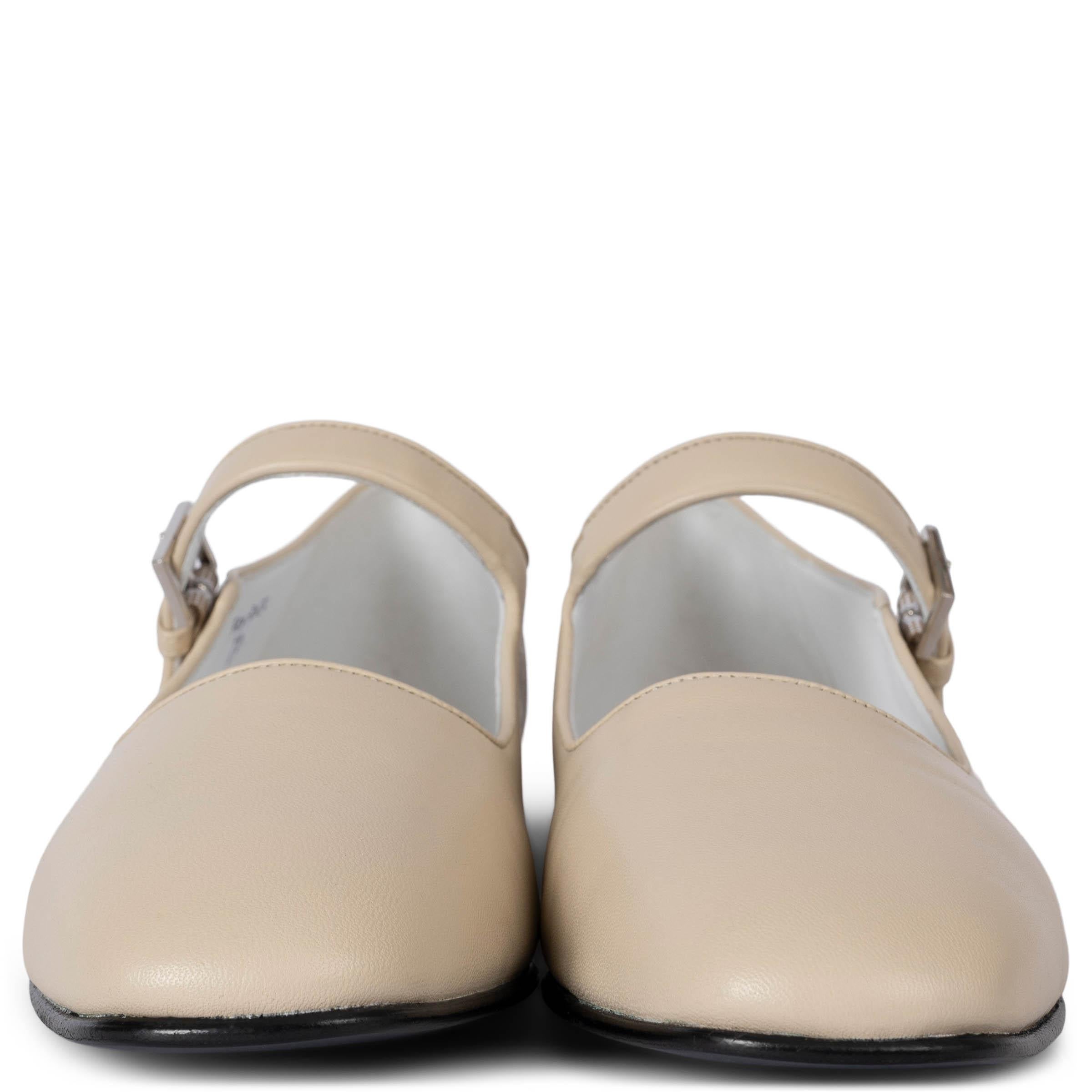 These 100% authentic The Row Ava Mary-Jane flats are crafted from cream smooth goatskin, featuring a silver-tone buckle closure for a refined, minimalist look. Designed with softly squared toes, these flats offer a perfect blend of elegance and