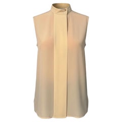 The Row Top tunique sans manches en soie crème taille US 0 Bouton devant col rond Flowy