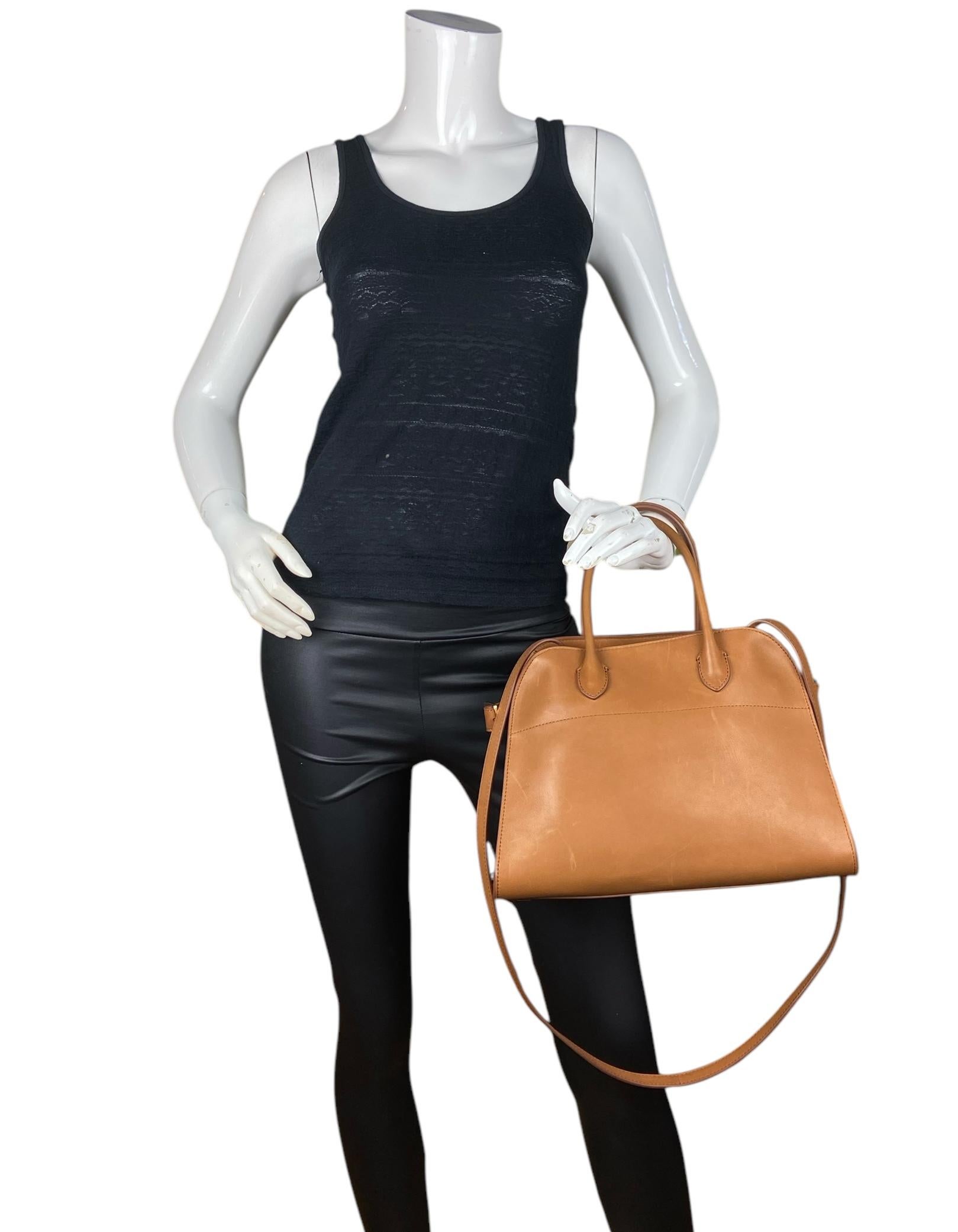 The Row Cuir Tasche aus poliertem Sattel- Kalbsleder und weichem Margaux 12

Hergestellt in: Italien
Farbe: Braun/Braun - 