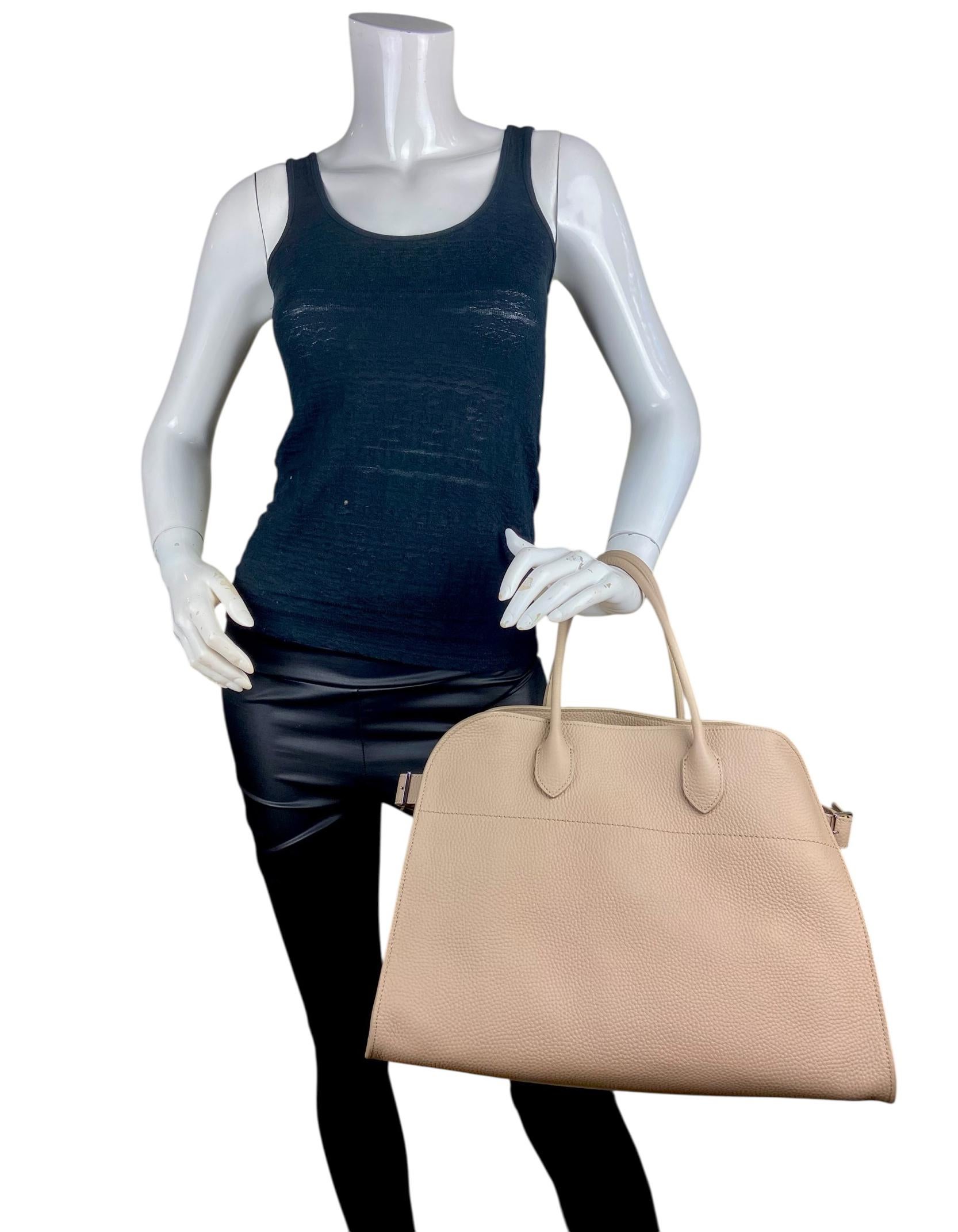 The Row Dark Taupe Pld Grained Calfskin Soft Margaux 15 Sac

Fabriqué en : Italie
Couleur : taupe foncé pld 
Matériel : Silvertone
Matériaux : Cuir
Doublure : Toile
Fermeture/ouverture : Ouvert avec boucles latérales
Poches extérieures :