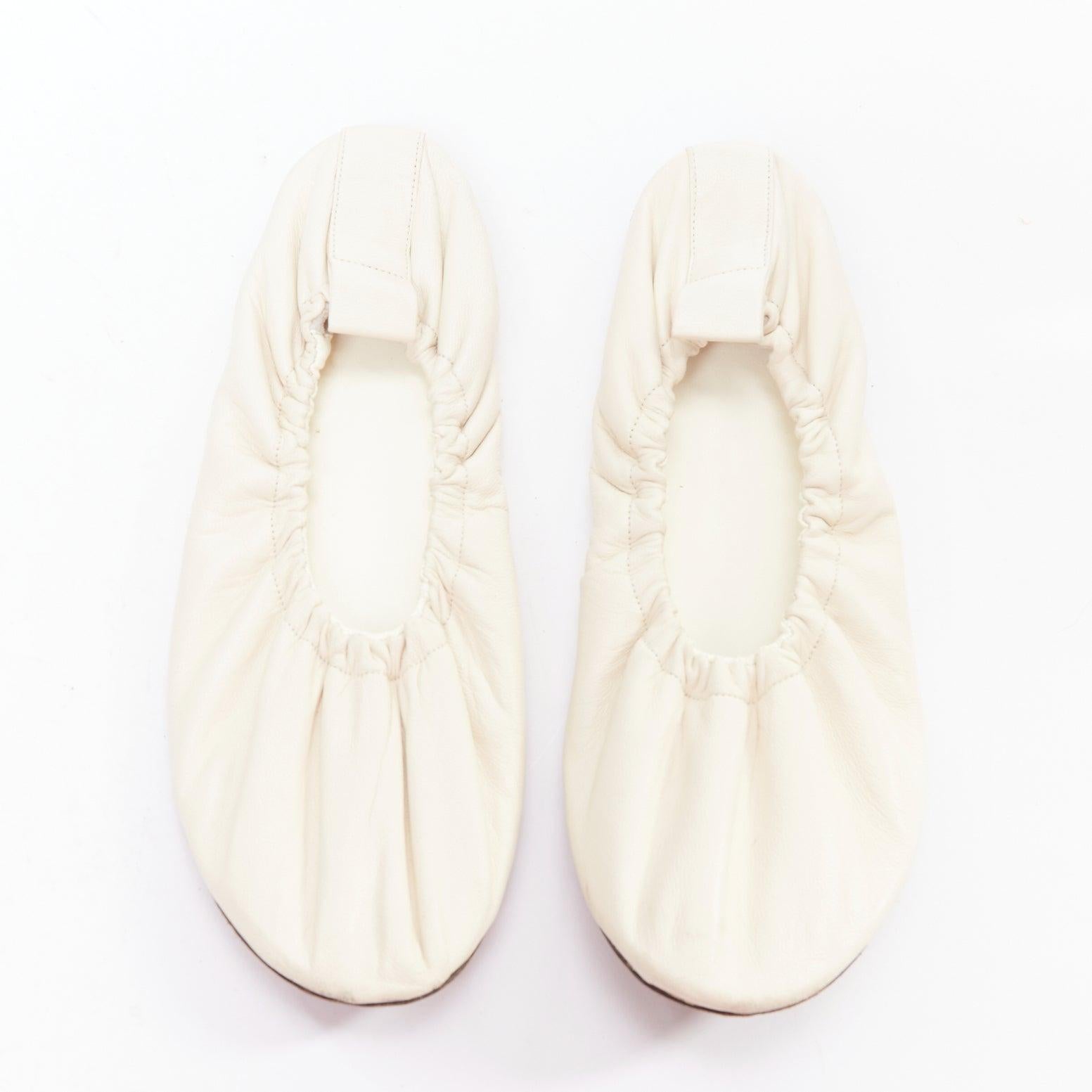 THE ROW ecru soft leather ruched simple ballerina flats EU37
Reference: KYCG/A00118
Brand: The Row
Designer: Mary Kate and Ashley Olsen
Material: Leather
Color: Nude
Pattern: Solid
Closure: Elasticated
Lining: Nude Leather
Made in: