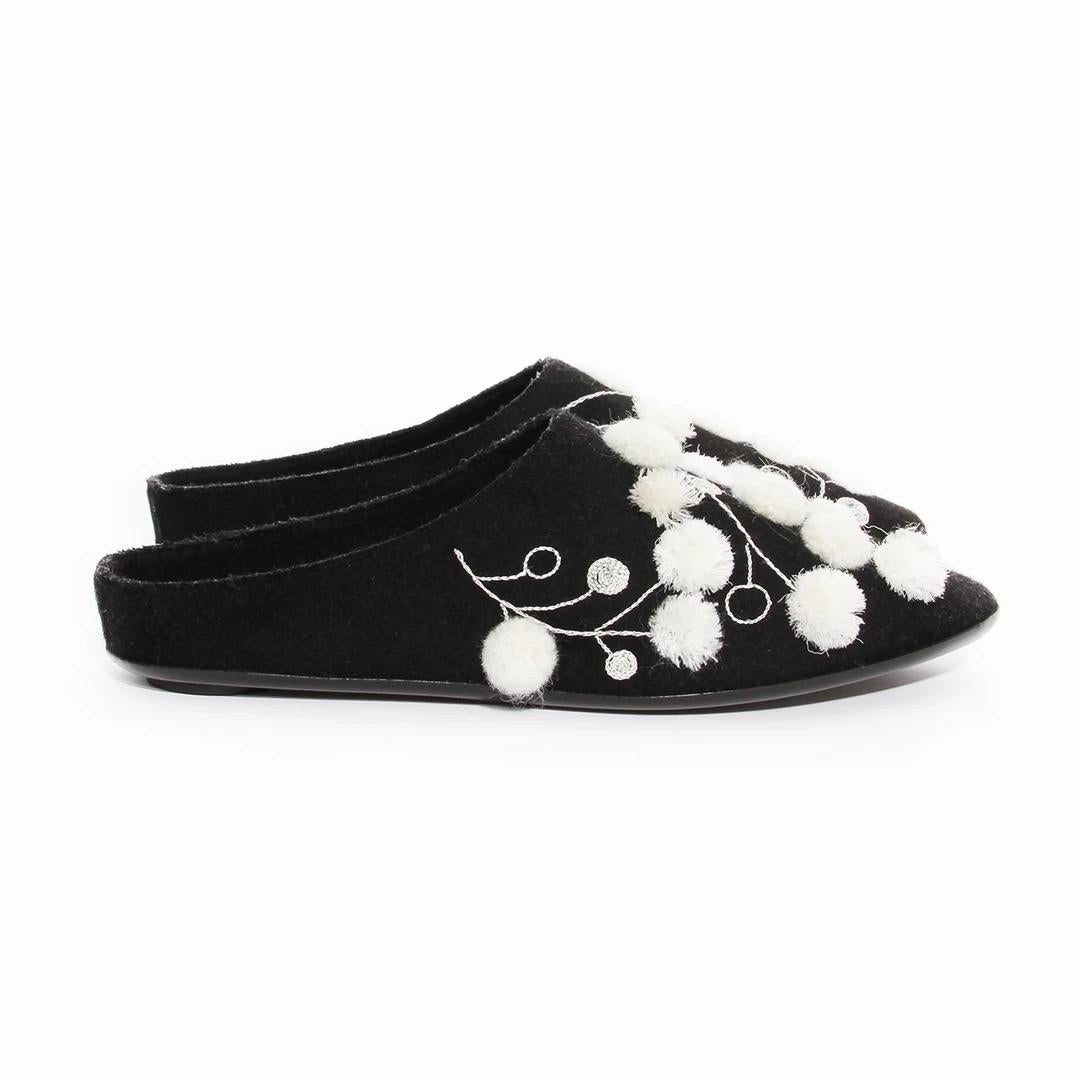 The Row Mule 
Made in Italy
Black Felt 
Embroidered with white thread and 