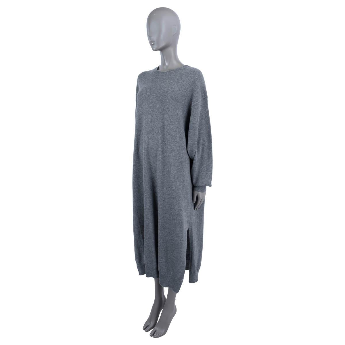 100% authentic The Row knit sweater dress in ultra-soft cashmere (100%). The design features a round neck, long sleeves, two slits on the side and pullover style rib-knit cuffs. Has been worn and is in excellent condition. 

Measurements
Tag