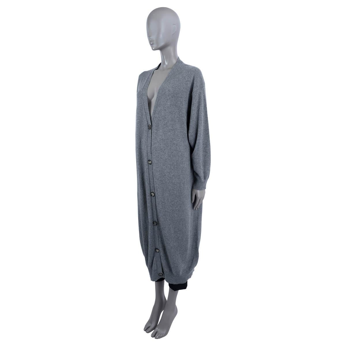 100% authentic The Row long-line knit cardigan in grey cashmere (100%). The design features six front buttons, a deep v-neck and rib-knit trim. Has been worn and is in excellent condition. 

Measurements
Tag Size	M
Size	M
Shoulder Width	60cm