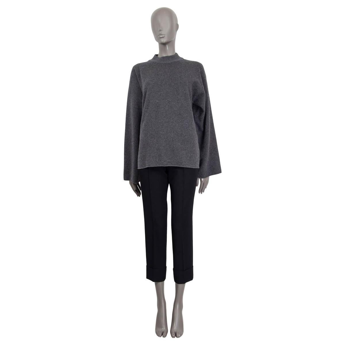 100% authentic The Row 'Daverio' long sleeve sweater in gray melange cashmere (84%) and silk (16%). Features a loose fit, a high neck and dropped sleeves that flare out. Unlined. Has been worn once and is in virtually new