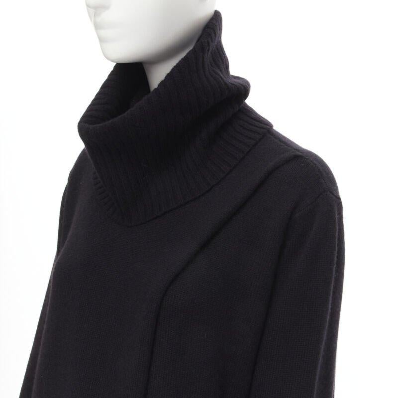 THE ROW Kirsi 100% cachemire noir pull à col roulé fendu sur le devant tunique S
Référence : MELK/A00101
Marque : The Row
Designer : Mary Kate et Ashley Olsen
Modèle : Kirsi
MATERIAL : Cachemire
Couleur : Noir
Motif : Solide
Détails supplémentaires