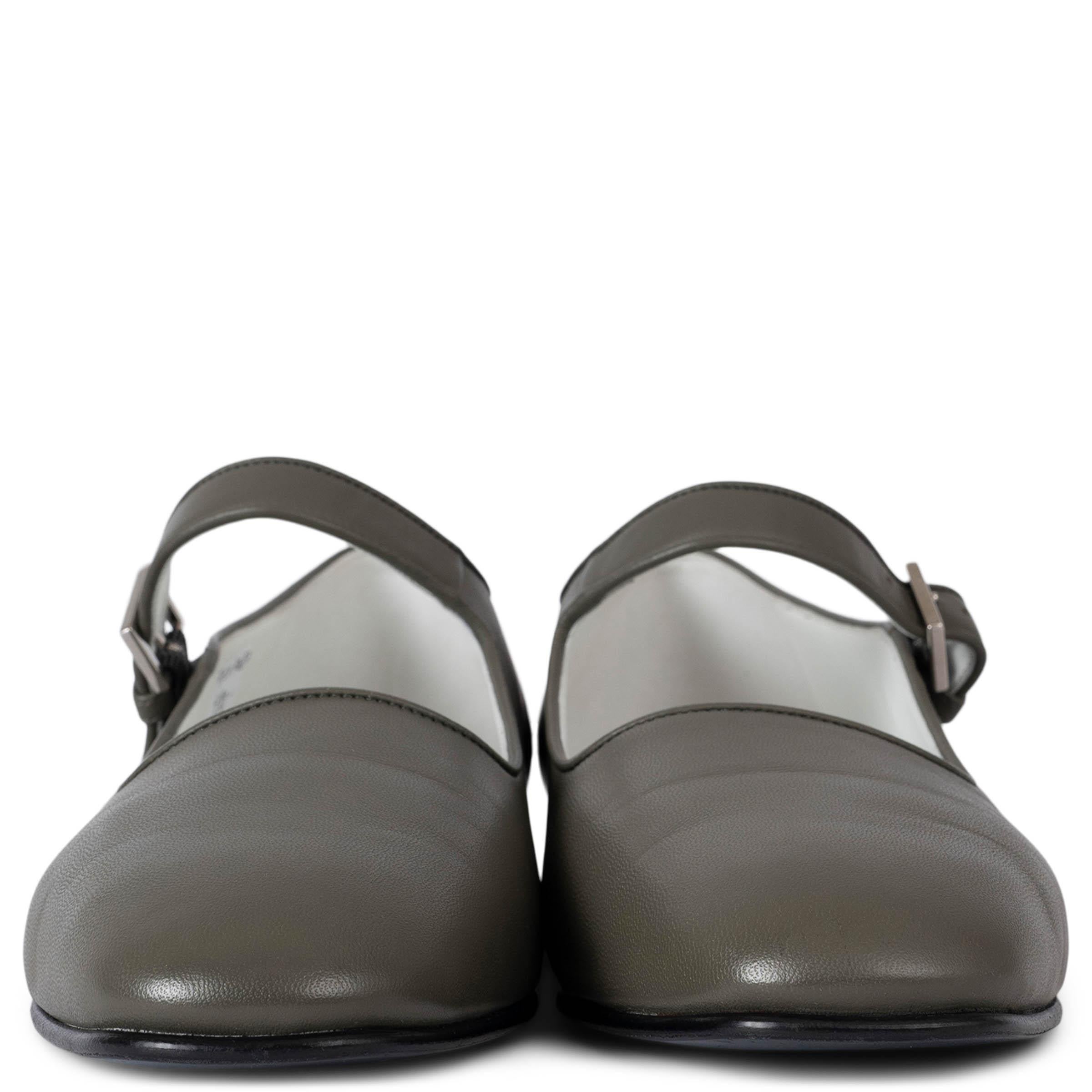 These 100% authentic The Row Ava Mary-Jane flats are crafted from Mangrove grey smooth goatskin, featuring a silver-tone buckle closure for a refined, minimalist look. Designed with softly squared toes, these flats offer a perfect blend of elegance