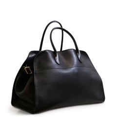 The Row Margaux 15 Black Calfskin Tote Bag with Gold Hardware