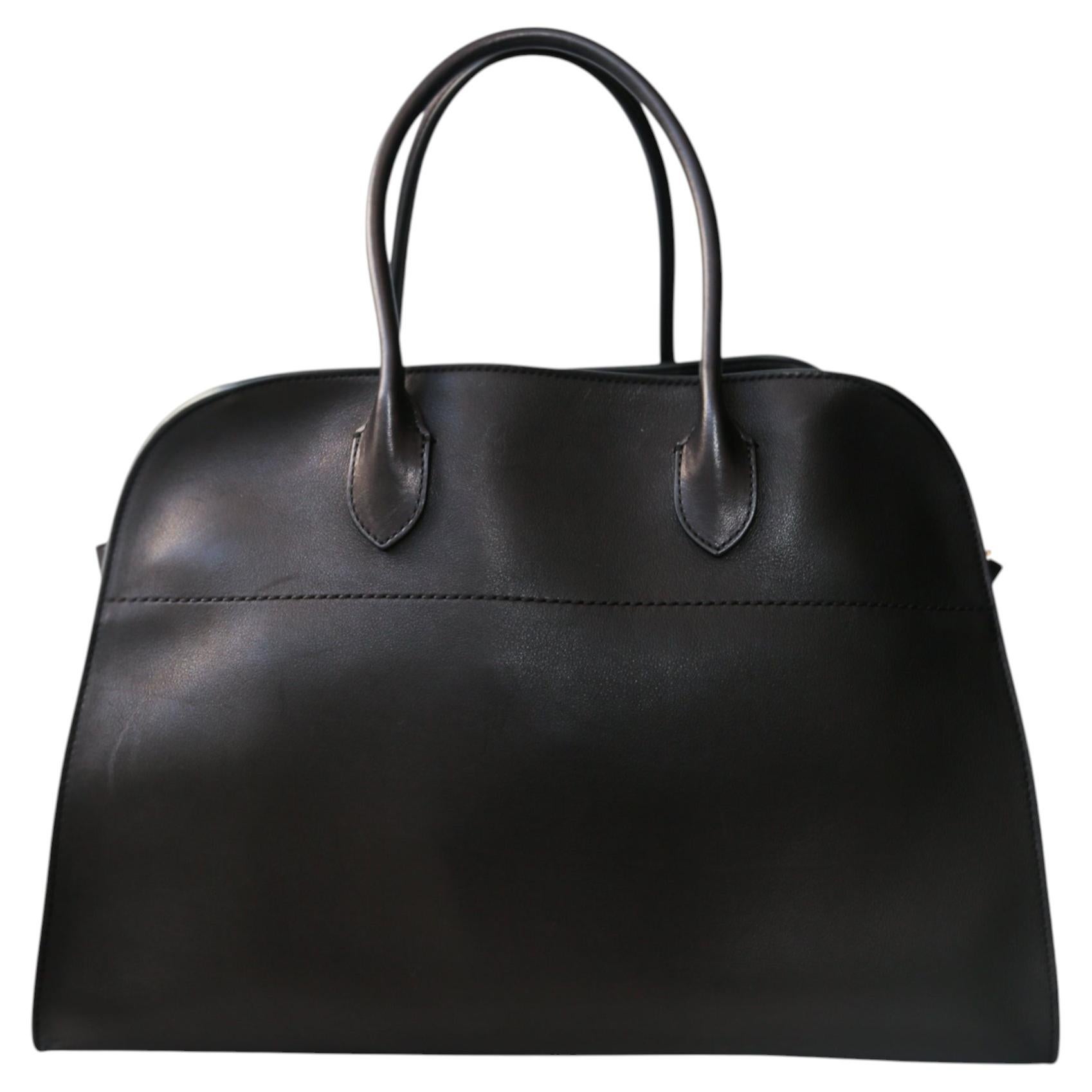 The Row Margaux 15 Black Calfskin Tote Bag with Gold Hardware