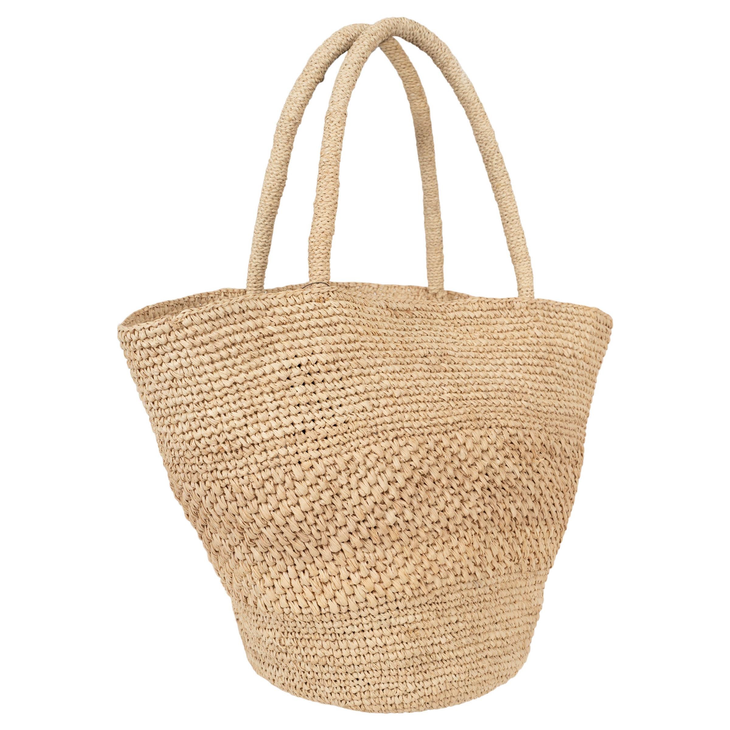 This 100% authentic The Row Emilie tote in natural handwoven raffia embodies effortless elegance with its dimensional texture and unstructured silhouette. Designed for versatility, it features two comfortable shoulder handles and an open top for