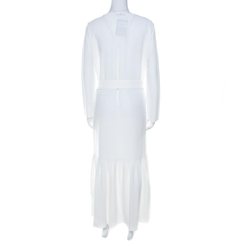 Amazingly stylish and effortlessly chic is this maxi dress from The Row. The off white full sleeve crepe creation features a belt at the waist. This comfortable dress promises to lend you a fantastic fit.

Includes: The Luxury Closet Packaging

The