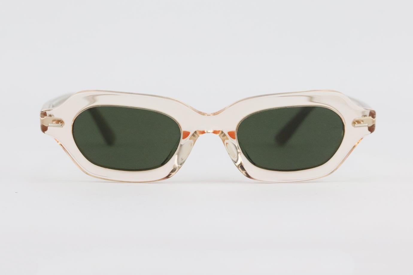 The Row + Oliver Peoples hexagonal frame acetate sunglasses. Light-pink. Does not come with case. Style code: LA CC. Lens size: 47 mm. Arm: 145 mm. Bridge size: 22 mm. Very good condition - No sign of wear; see pictures.