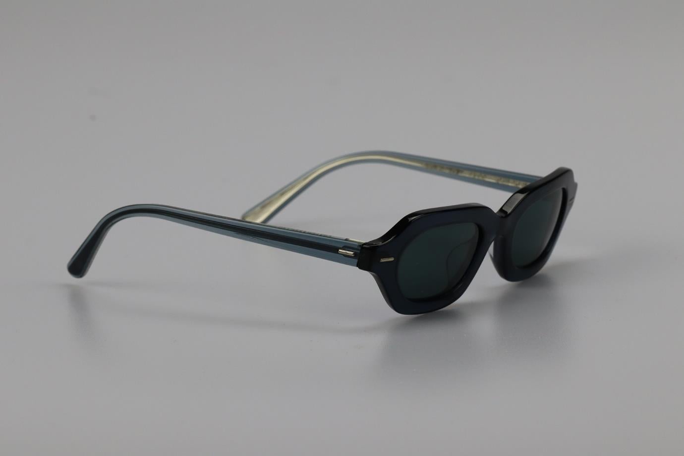 The Row + Oliver Peoples Hexagonal Frame Acetate Sunglasses. Blue. Does not come with - case. Style code: OV5386SU. Lens: 47 mm. Arm: 145 mm. Bridge: 22 mm. Condition: Used. Very good condition - Barely worn. No sign of wear; see pictures

