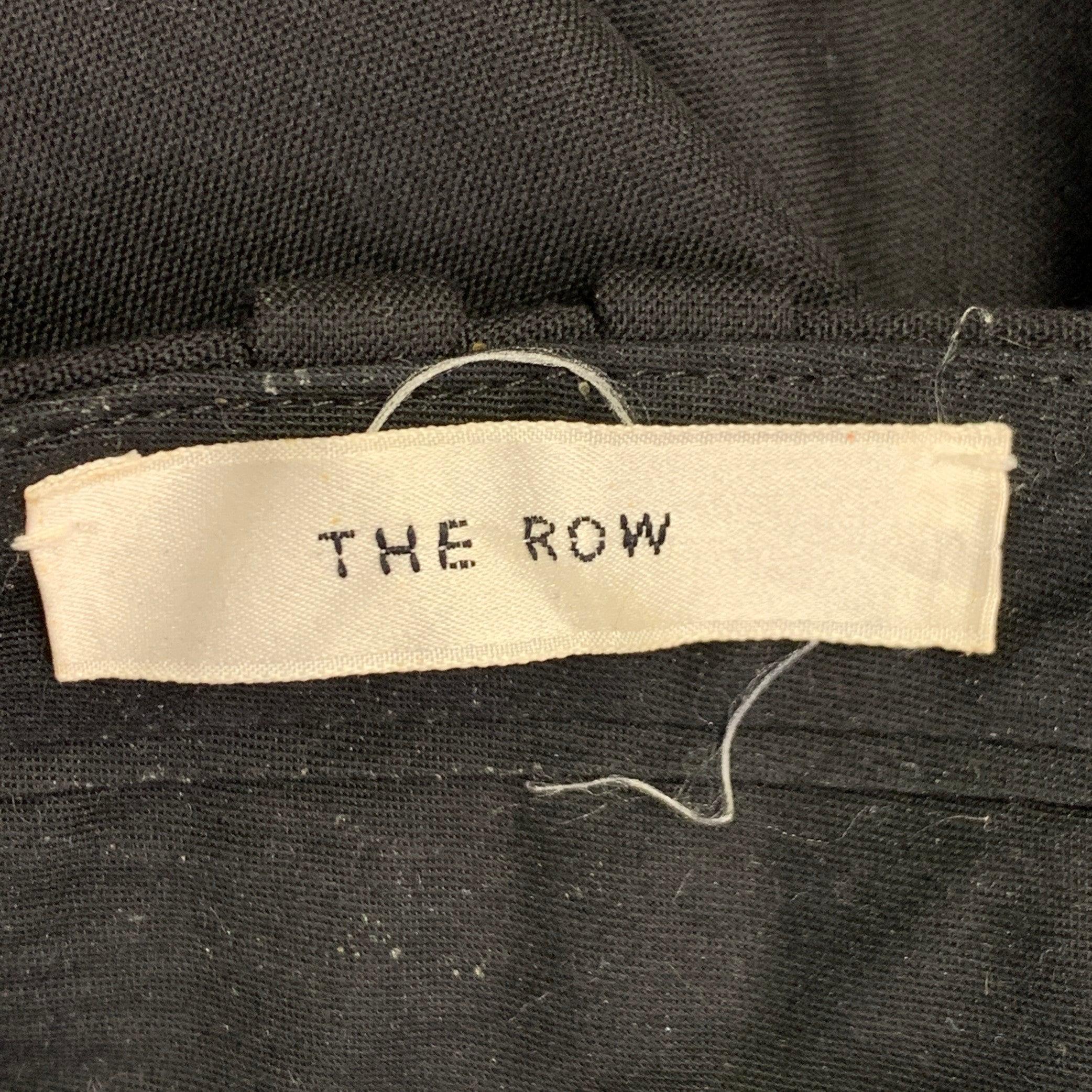 THE ROW Talla 0 Pantalones de vestir negros de lana virgen con pliegues y cremallera en la cintura en Bueno estado para la venta en San Francisco, CA