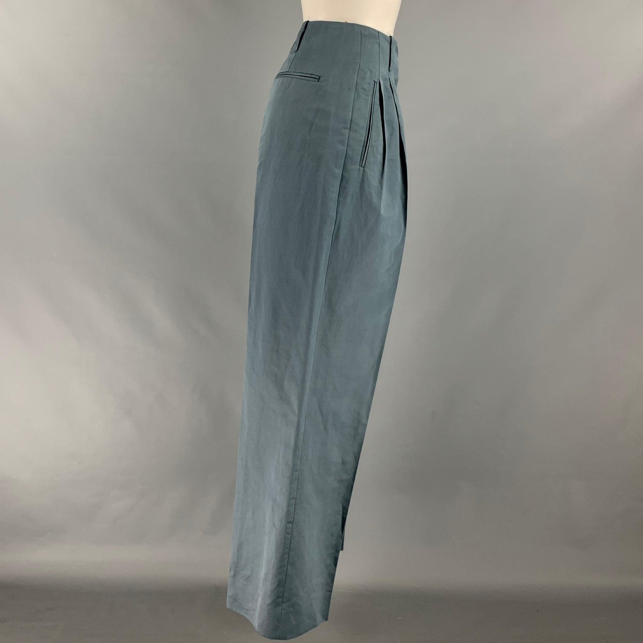 THE ROW 2023 dress pants comes in a grey cotton ramie woven featuring a high waist, wide leg, pleated front, and a zipper fly closure. Made in Italy. Excellent Pre-Owned Condition. 

Marked:   0 

Measurements: 
  Waist: 28 inches Rise: 13 inches