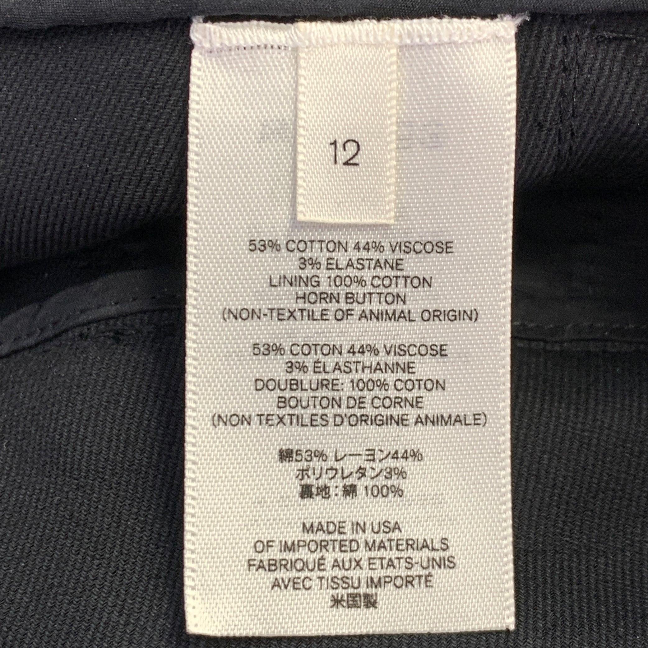 THE ROW Taille 12 Pantalon habillé en sergé de coton mélangé noir avec fermetures à glissière au niveau des chevilles en vente 1