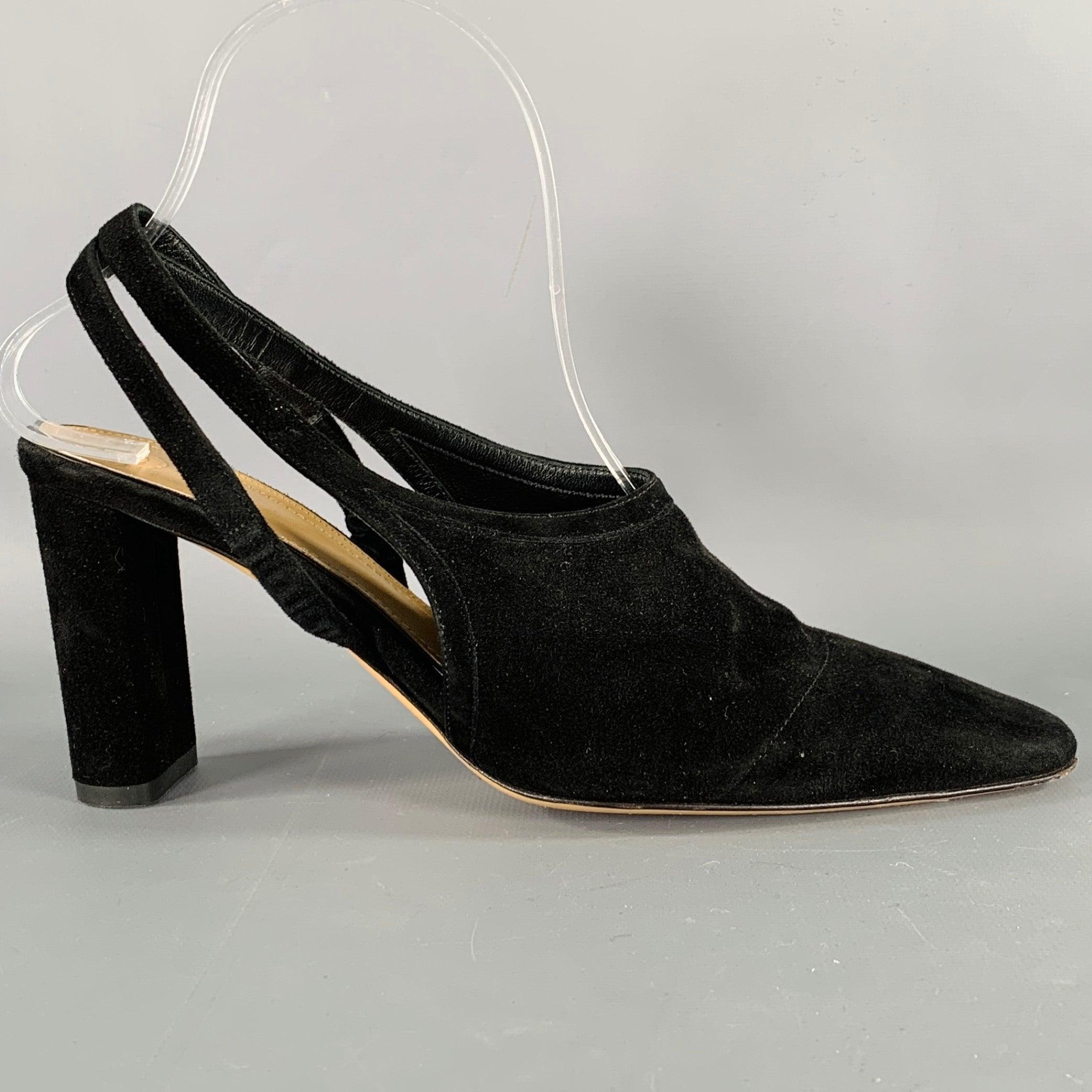 THE ROW pumps
in a black suede featuring a slingback style with double strap closure, and chunky heel. Made in Italy.Excellent Pre-Owned Condition. 

Marked:   IT 37.5 

Measurements: 
  Heel: 3.25 inches 
  
  
 
Sui Generis Reference: