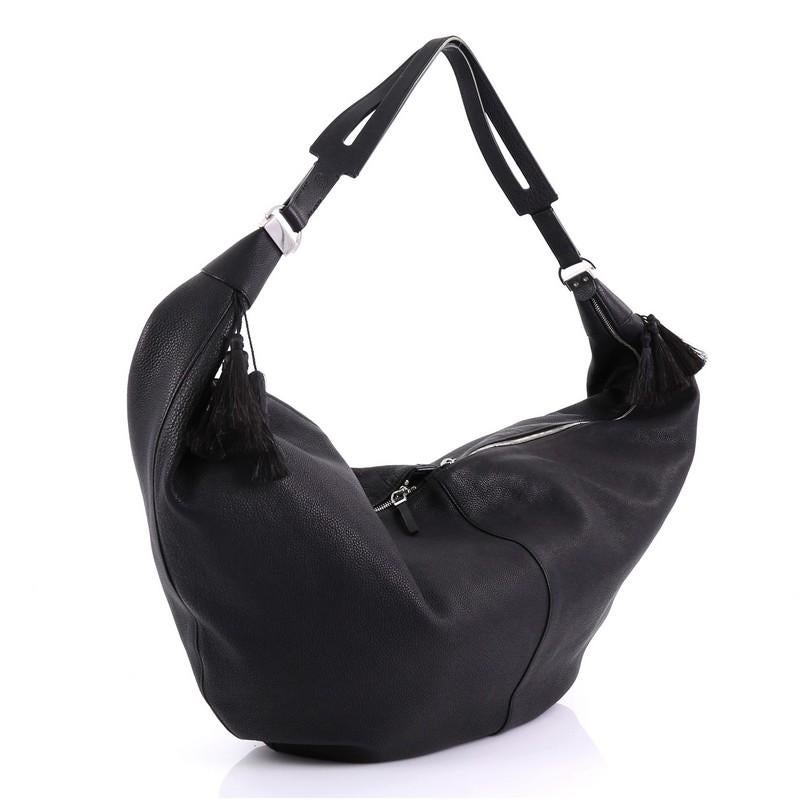 This The Row Sling Hobo Leather 15, crafted in black leather, features wide flat leather strap and silver-tone hardware. Its zip closure opens to a gray fabric interior with slip pocket.

Estimated Retail Price: $2,950
Condition: Excellent. Small
