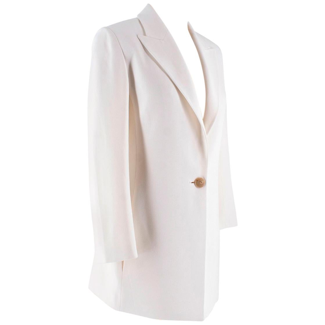The Row White Suit - utterly timeless

-Blazer and trouser suit

Trousers fit UK size 8/10 and the jacket is a Uk 6/8
There is stretch to the material so is super luxurious and comfortable
Please email admin with any questions  


Blazer:
-White