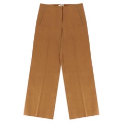 Pantaloni sartoriali a gamba larga in lana vergine e misto seta di The Row
