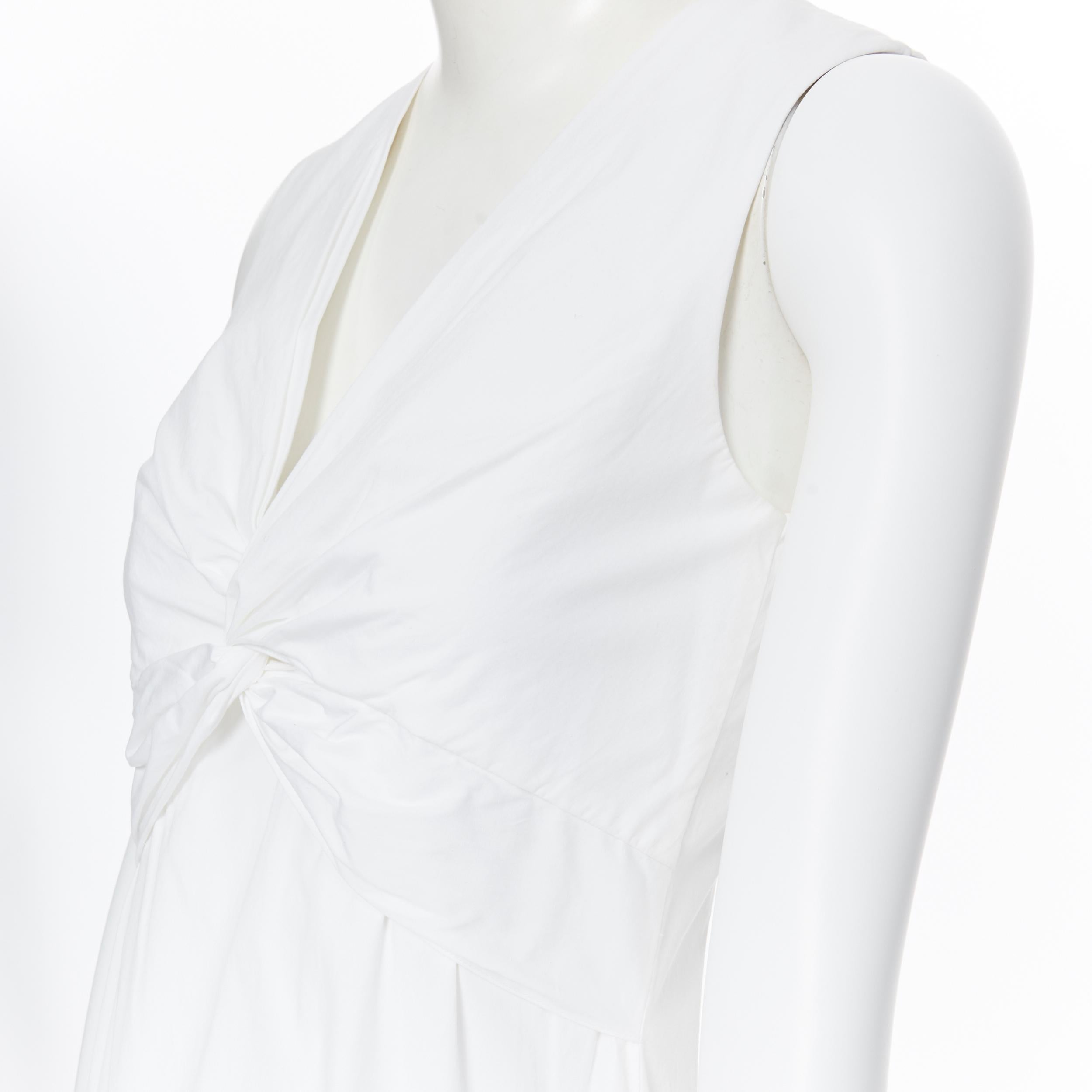 THE ROW white cotton blend draped knot bust V-neck minimal maxi dress US0
Brand: The Row
Model Name / Style: Day dress
Material: Cotton blend
Color: White
Pattern: Solid
Extra Detail: Knotted draped bust. Pull on dress. Sleeveless. V-neck
