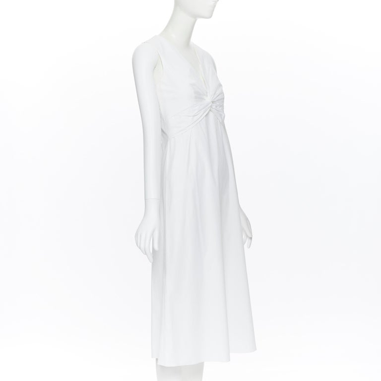 the row white gown