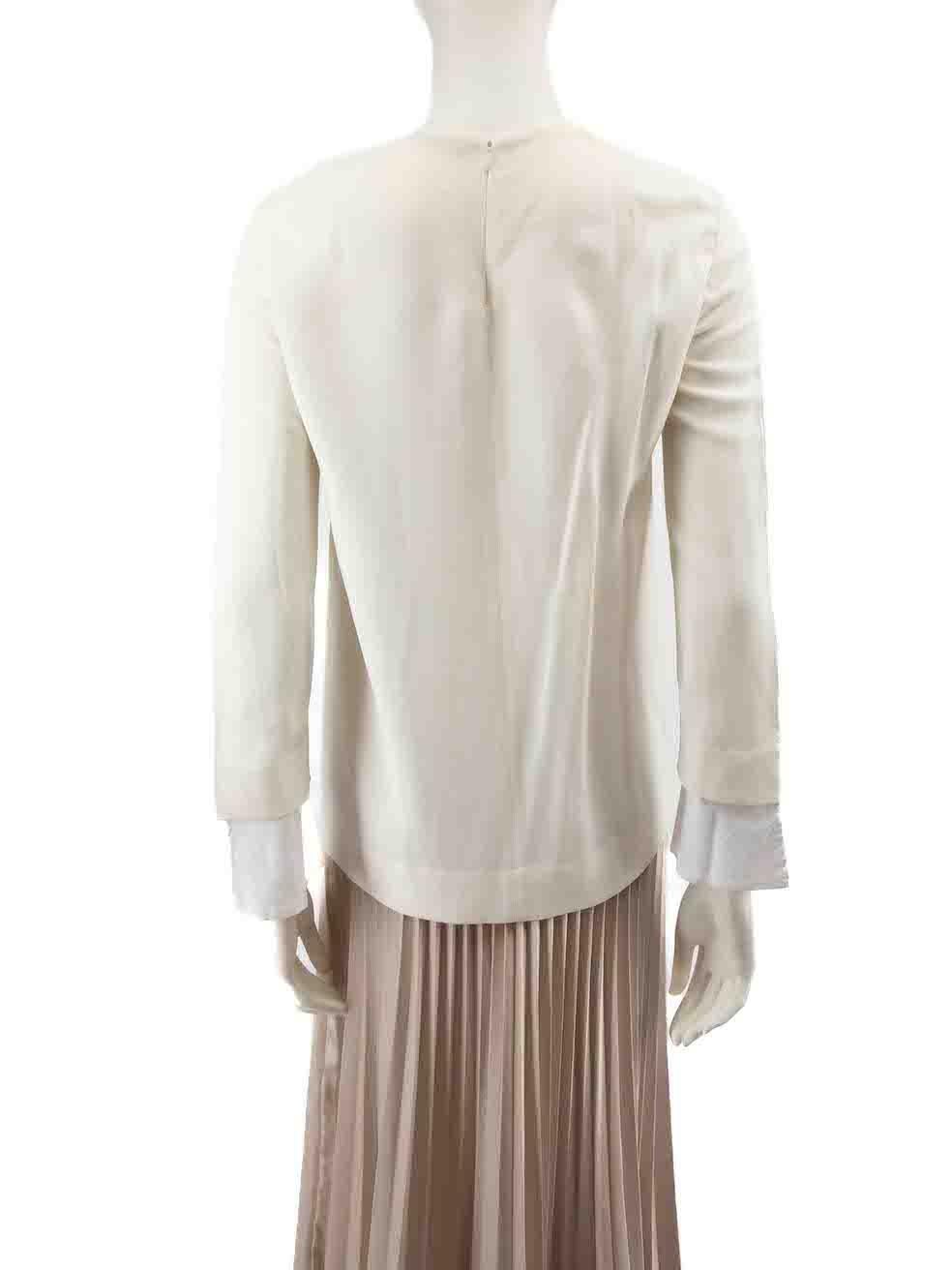 Bianco The Row Top bianco a girocollo e maniche lunghe taglia XS in vendita