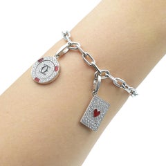 Bracciale Santos de Cartier A Link con due charms di diamanti