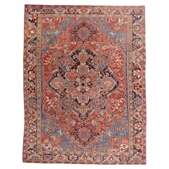 The Sapphire Sovereign: An Antique Persian Heriz Masterpiece of Regal Elegance