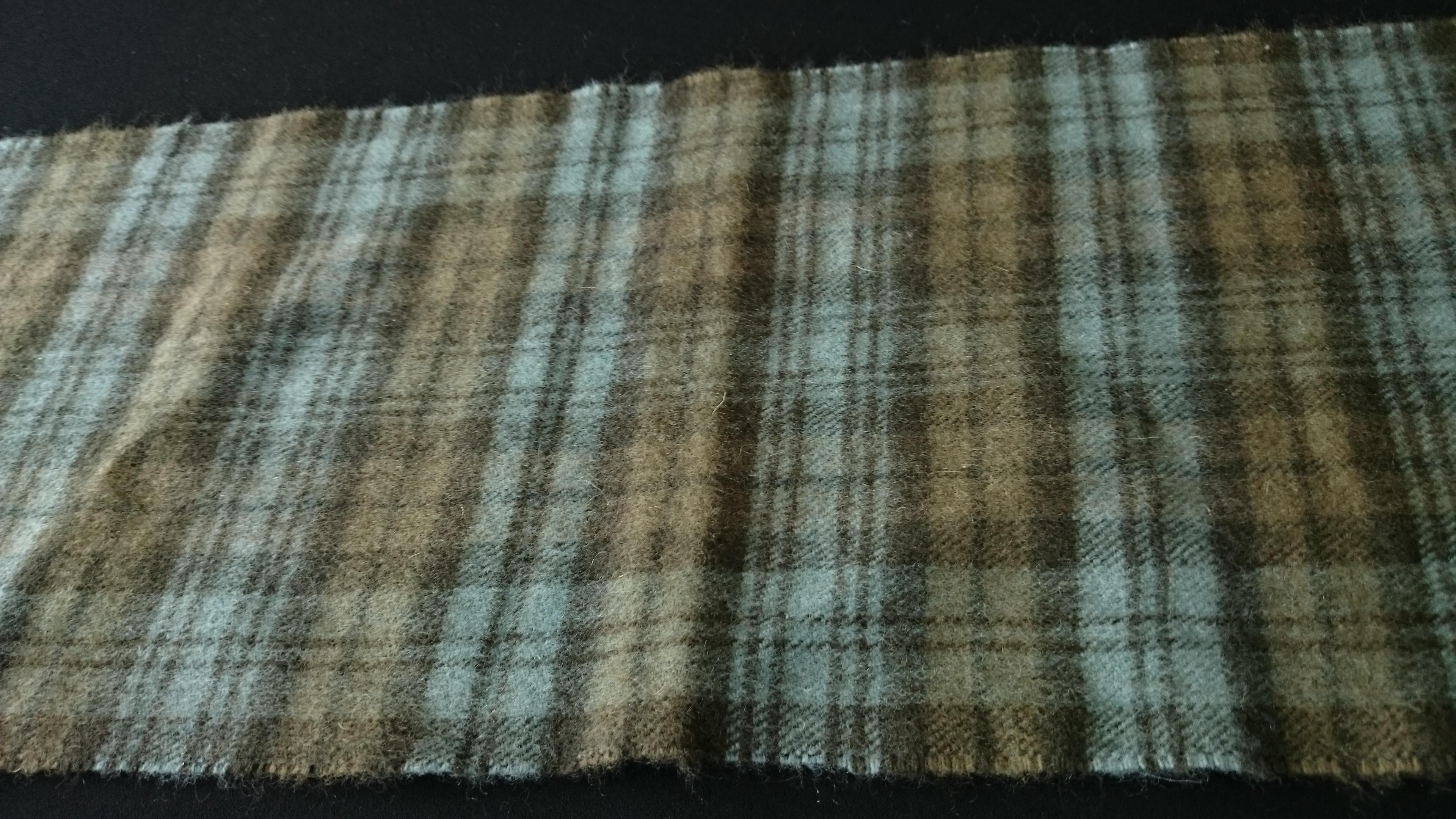 The Scotch House Scarf
70% Scottish Cashmere
30% Wool
Total length: 117 cm
Length: 111 cm
Width: 21 cm
Stripes: 3 cm 
Made in Scotland. 
