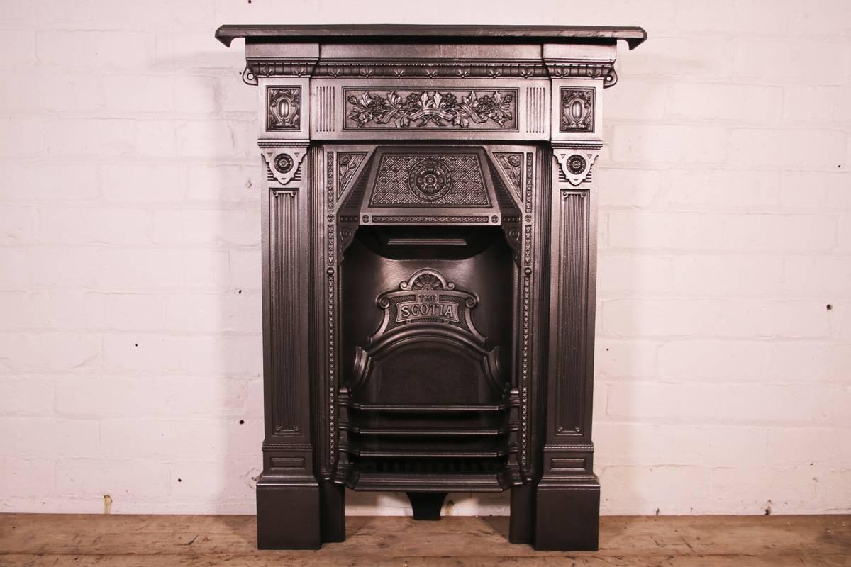 'The Scotia' a popular late Victorian cast iron bedroom fireplace. Dated 1884-1885. 

Priced per fireplace 

This grate has been finished the traditional black grate polish, leaving a gun metal / pewter shine.

Ready to be installed and used