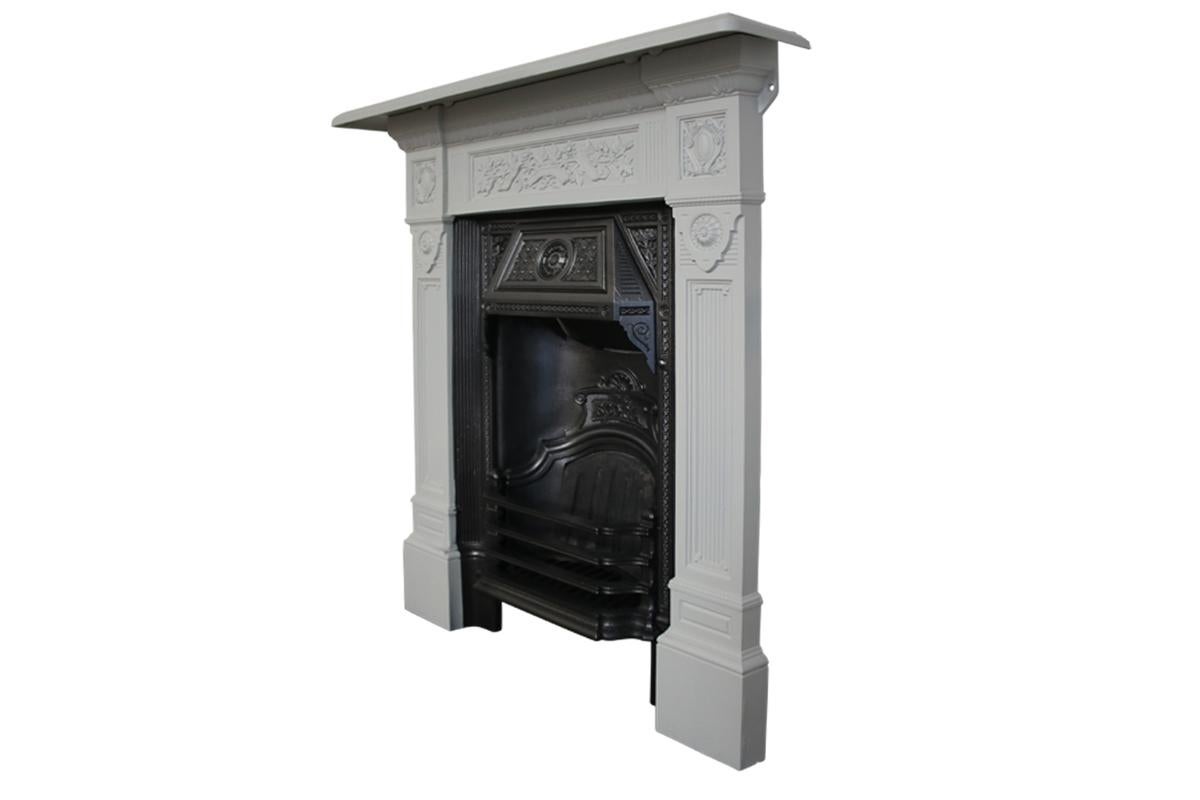 'The Scotia' a popular late Victorian cast iron combination grate, circa 1885. 

Fully restored, The outer surround has been finished with a high quality universal paint primer so it can be painted your choice of top coat once installed. The inner