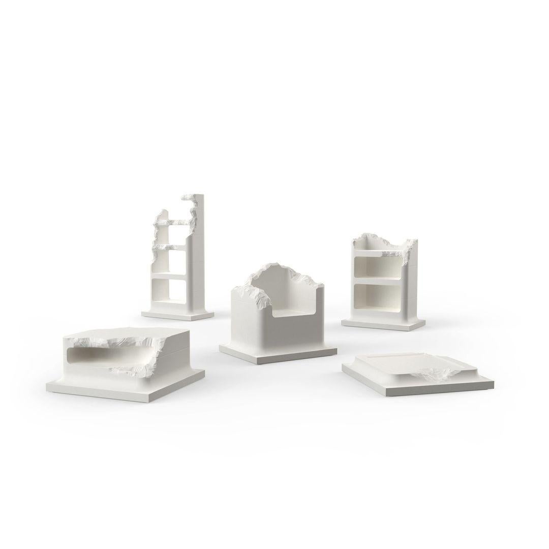 Radical and monumental, the new SCULPTED SERIES is a family of five domestic sculptures available only in black or white including a bookshelf, a bar cabinet, an armchair, a coffee table and low table. 

As in all sculptures, each piece from the