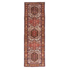 The Sentinel Corridor: A Vintage Persian Heriz Masterwork of Tribal Elegance