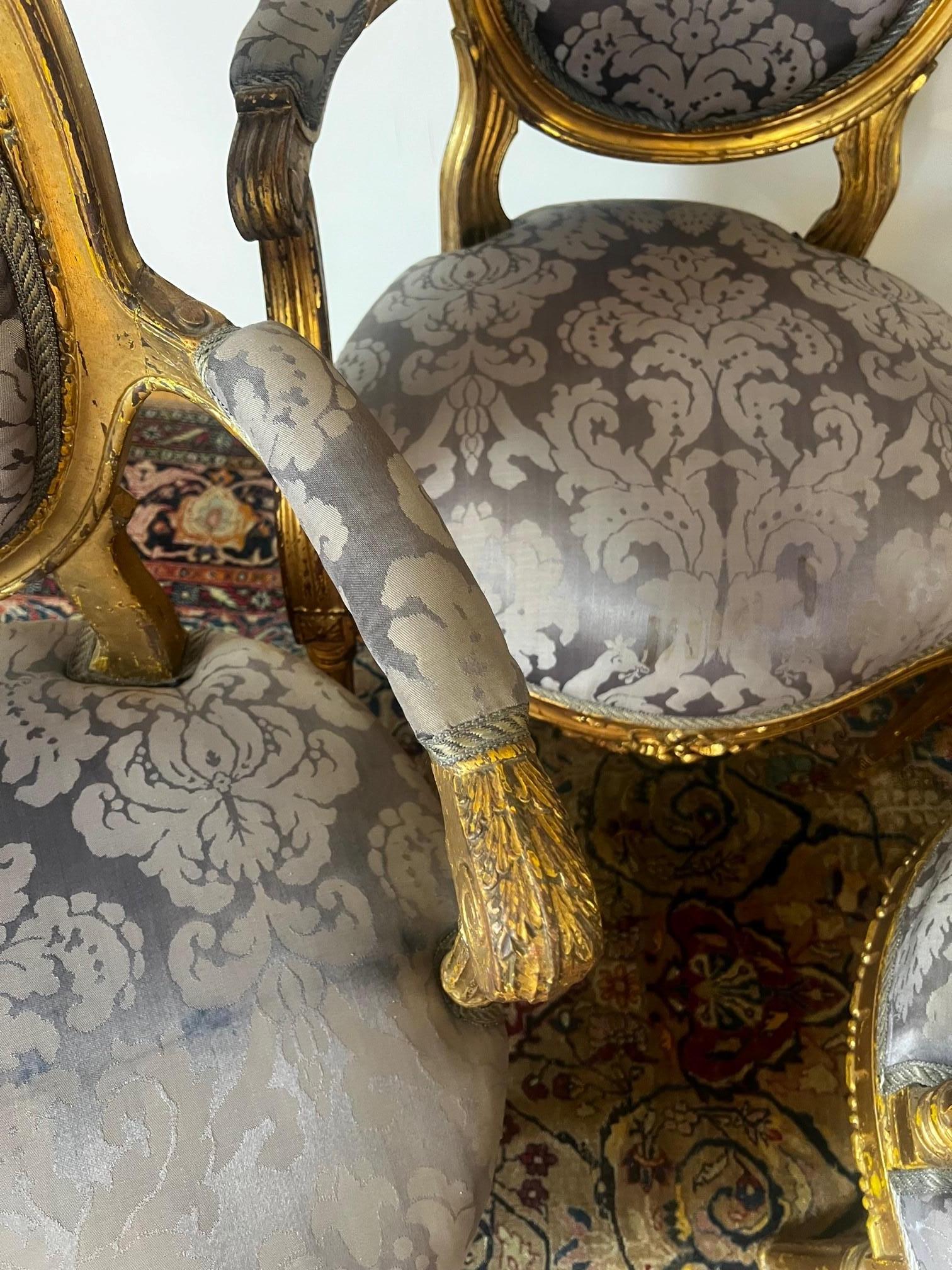 The Set of Three Original 18th Century Louis XVI Gold Gilded Armchairs In Good Condition For Sale In Doha, QA