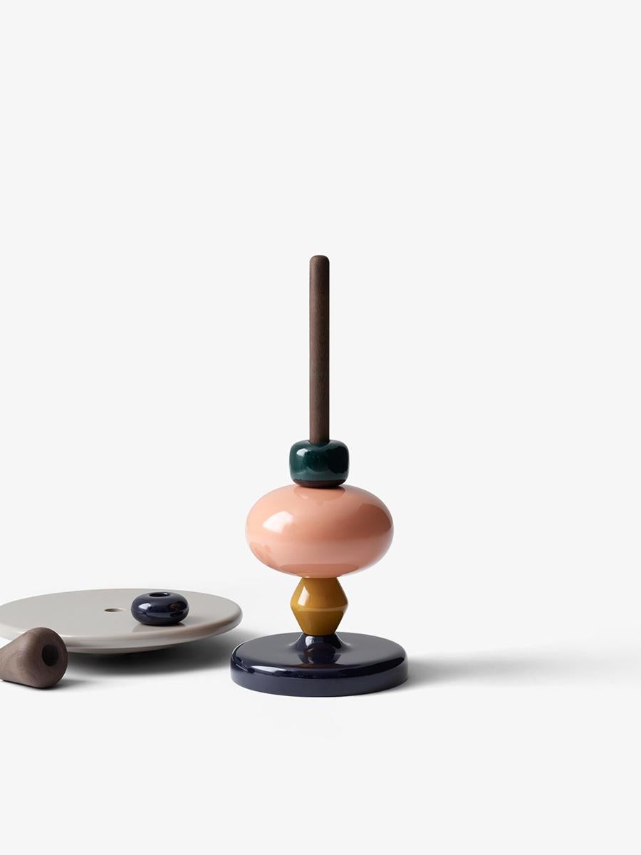 The Shuffle side table in Spectrum colors seems to conjure images of classic wooden toys and with good reason. 
The choice of colors and the fact that you can unify and construct the table as you like are all ideas Mia Hamborg got from the Brio