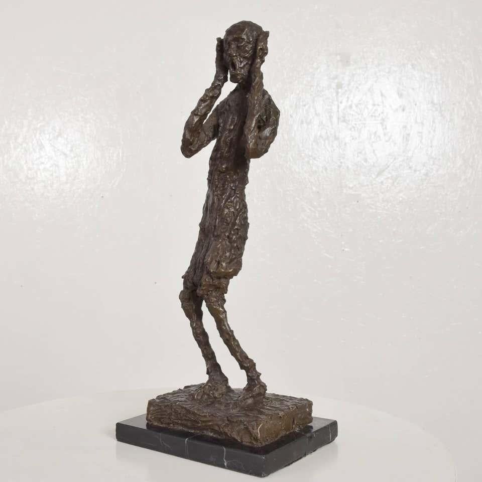 Mid-Century Modern bronze table sculpture after the 'The Scream' face screaming in fear- famed art work by Norwegian artist Edvard Munch.
A timeless piece image still the ultimate say- plenty of reasons to scream today.
This sculpture in unsigned,