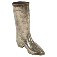 The Silver Boot – Mid-20th Century Sculpture, Signed Dora Turkmall
