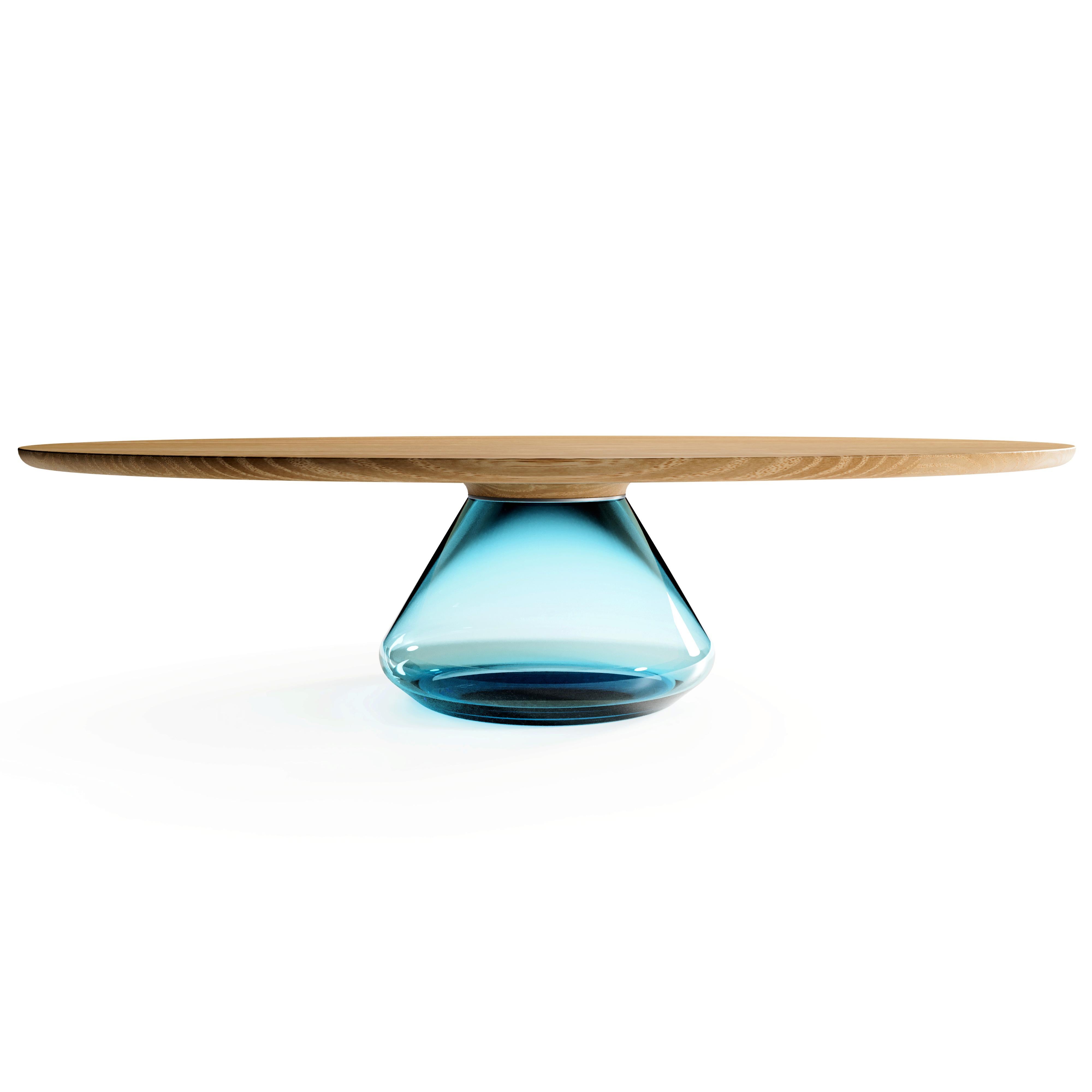 The Sky Eclipse I, limited edition coffee table by Grzegorz Majka
Limited edition of 8
Dimensions: 54 x 48 x 14 in
Materials: Glass, oak

The total eclipse of every interior? With this amazing table everything is possible as with its Minimalist