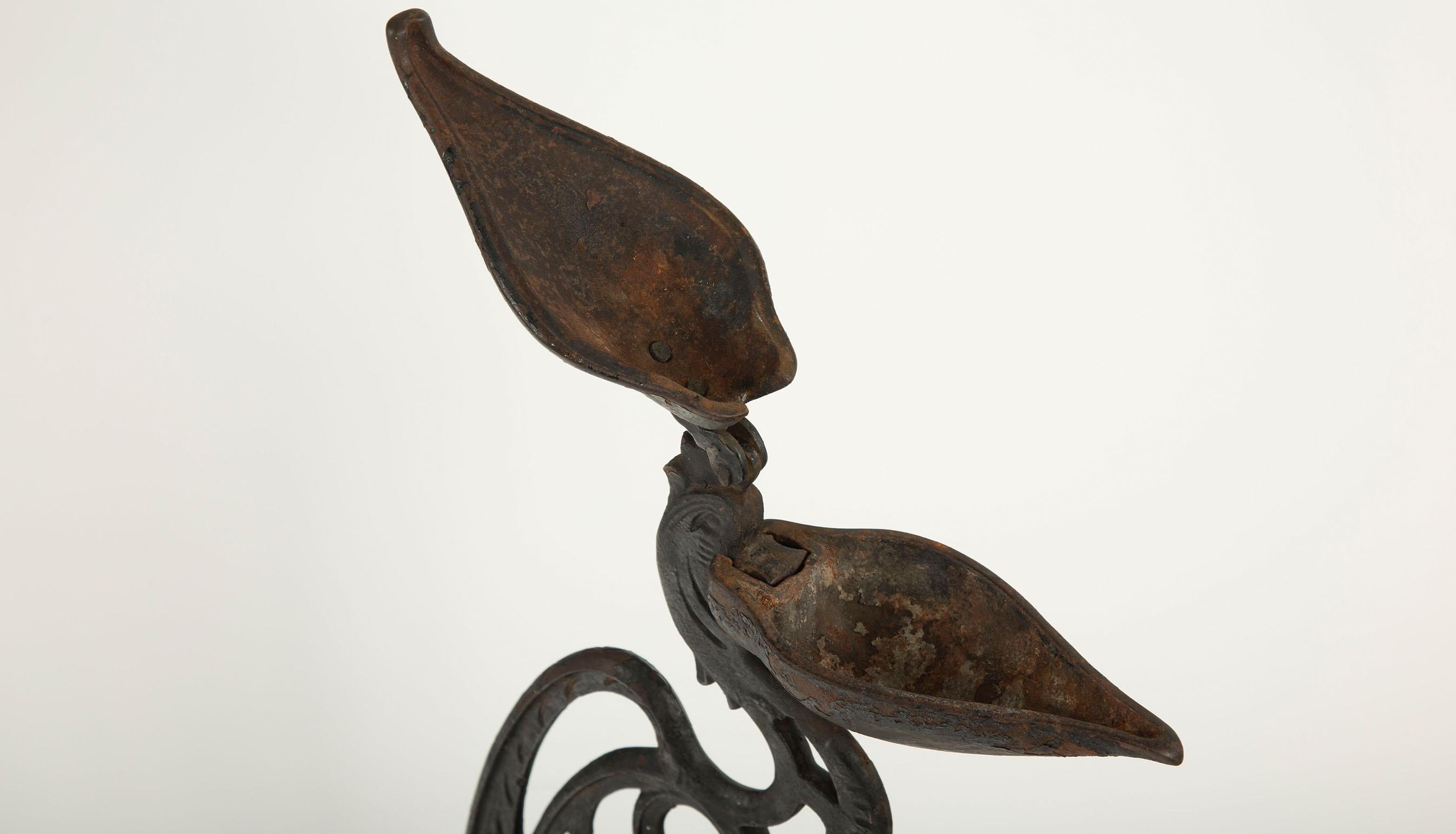 Fer Le calao fumeur : Sculpture cendrier décorative en vente