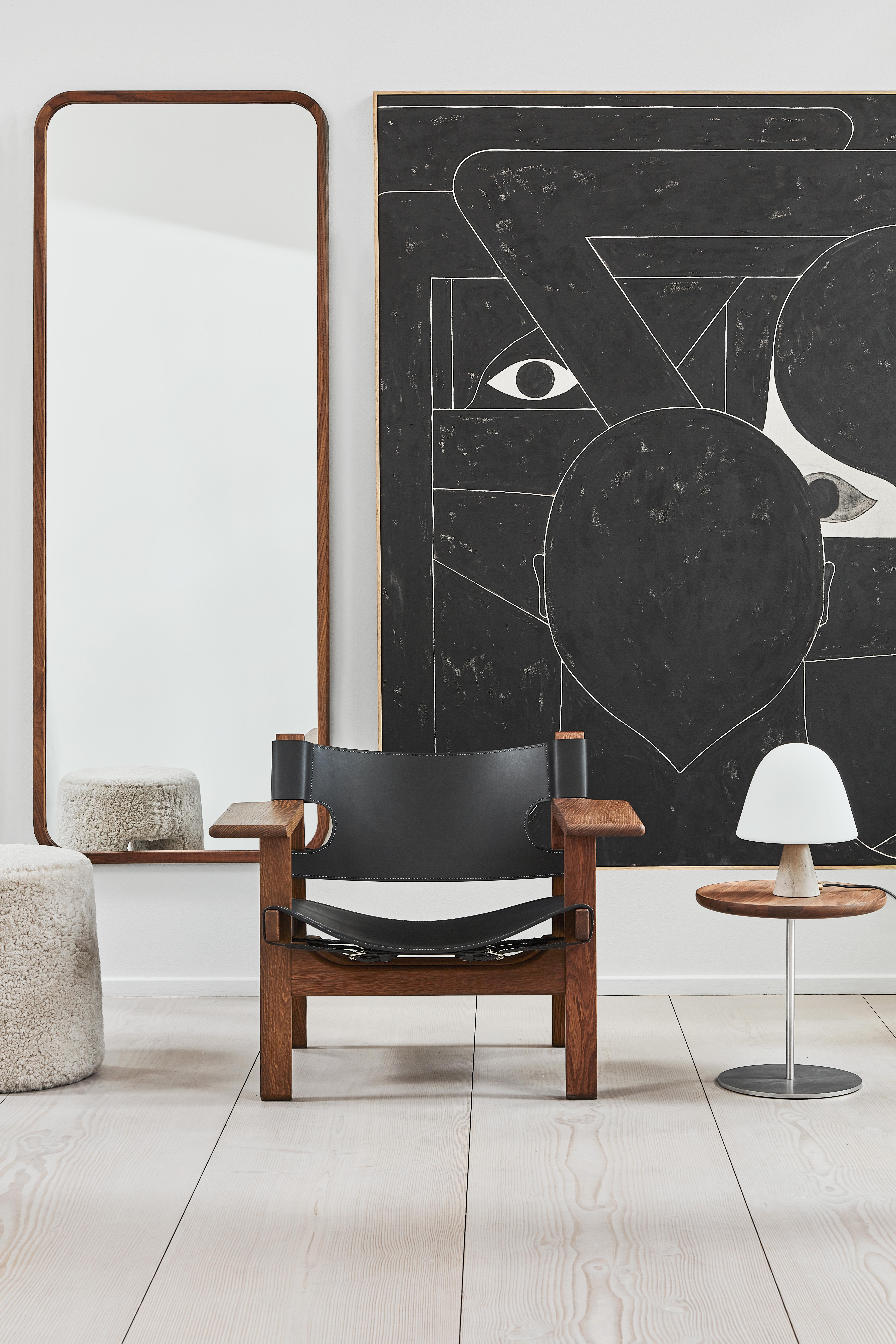 The iconic Spanish chair is Børge Mogensen’s masterful contribution to modern design, designed for Fredericia in 1958. Solid oak or walnut combined with the highest caliber saddle leather creates a strong presence in a chair that will only become