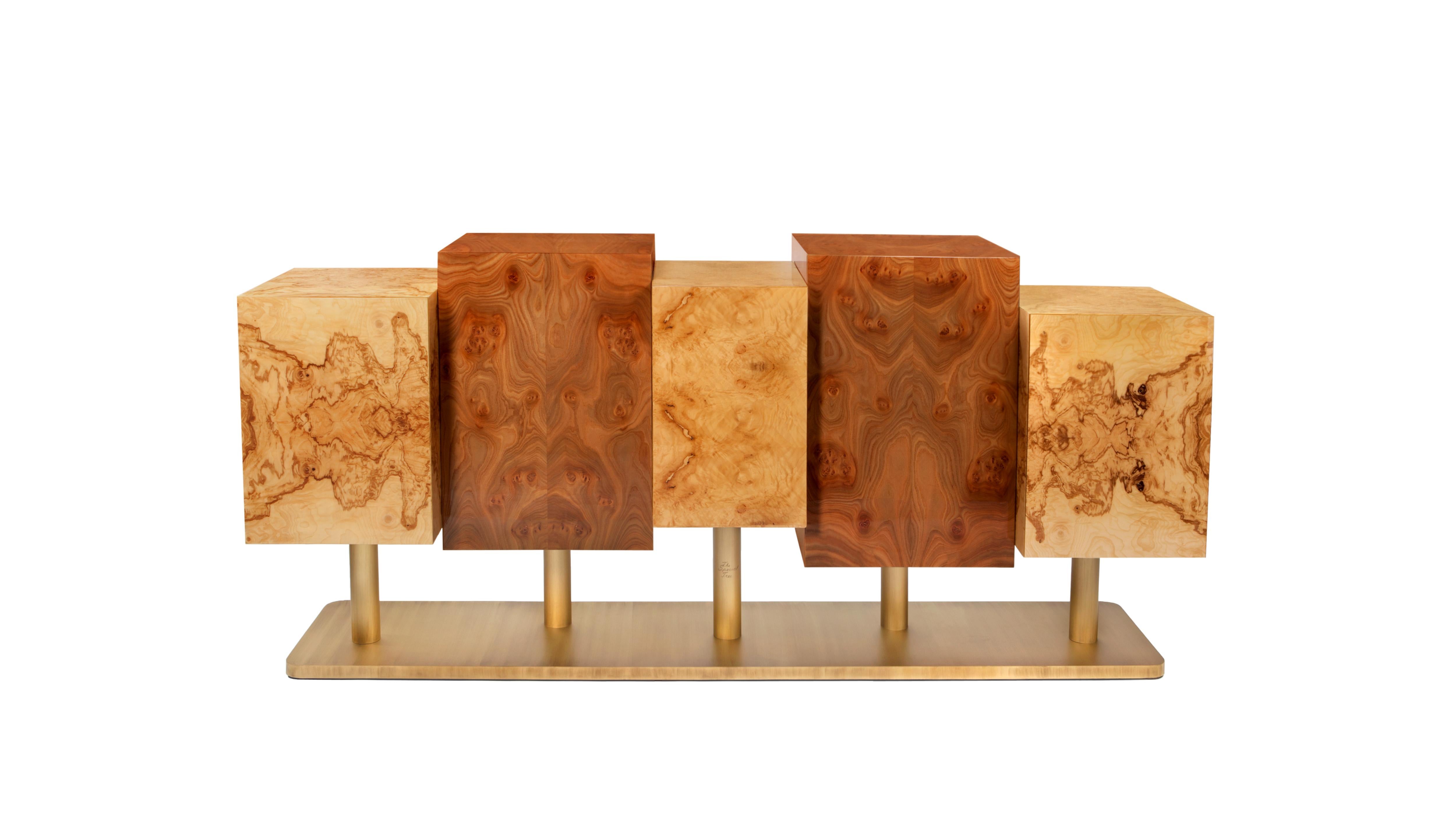 The Special Tree Sideboard by InsidherLand
Dimensions: D 53 x W 200 x H 95 cm.
Materials: 
Wooden structure: exotic veneers (myrtle root, elm root, and olive ash burl) and interior in
satinwood veneer. Shelves: glass. Base, tubes, and shelf