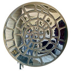 The "Spiral Mural" by Plus Object made of glass