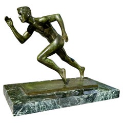 Escultura de bronce "El velocista" de Joe Brown