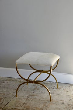 The 'Strapontin' Gilt Metal and White Hide Stool by Design Frères