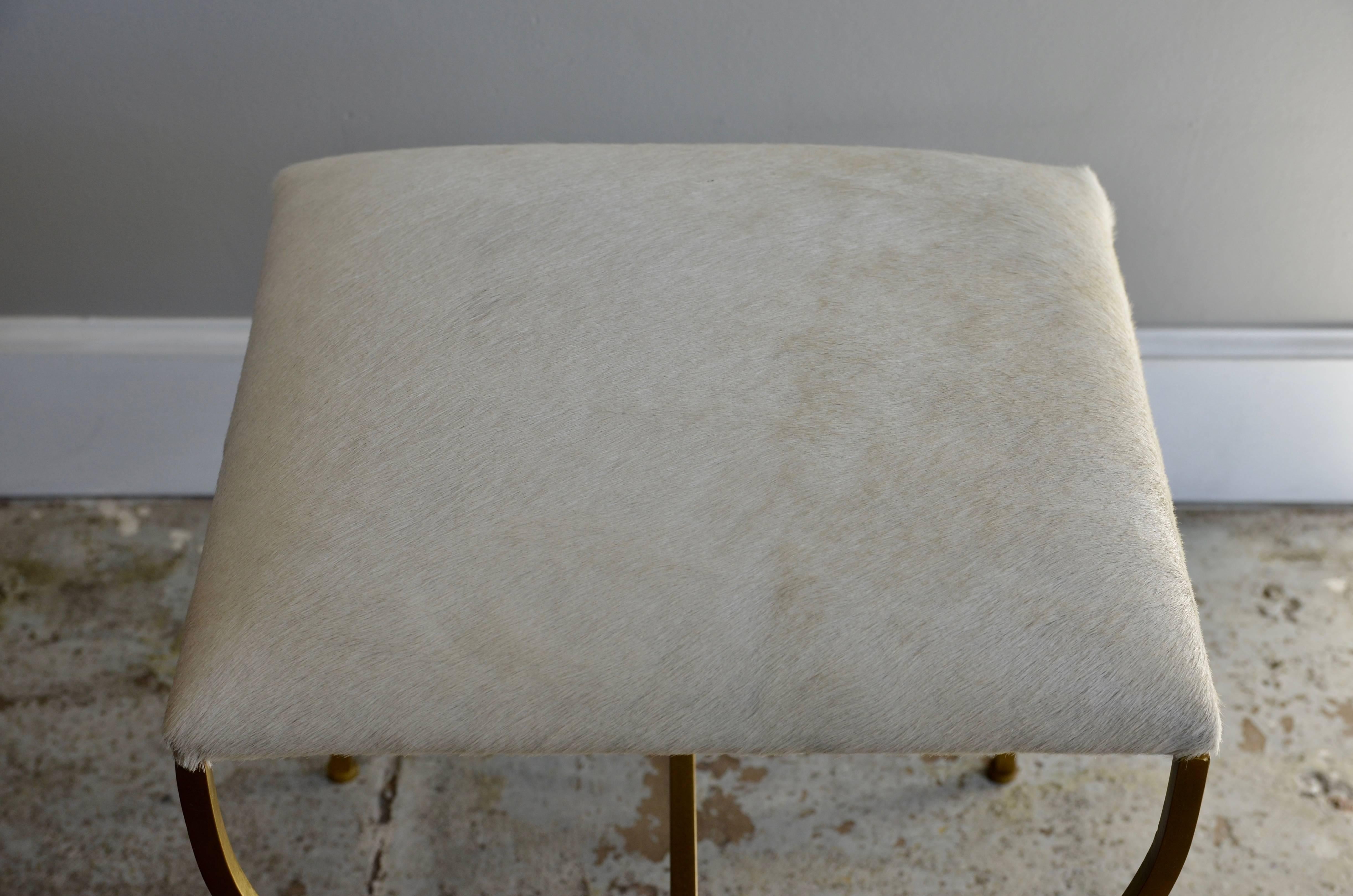 French The 'Strapontin' Gilt Metal and White Hide Stool by Design Frères